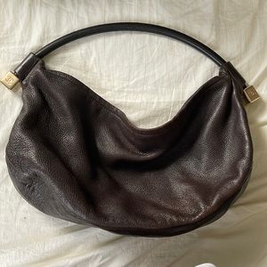 Very simple and versatile slouch purse from Chanel .